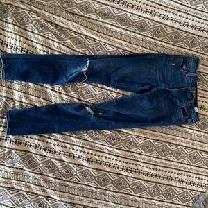 Lucky Brand-Bridgette Skinny- dark-wash jeans with distressed knees.